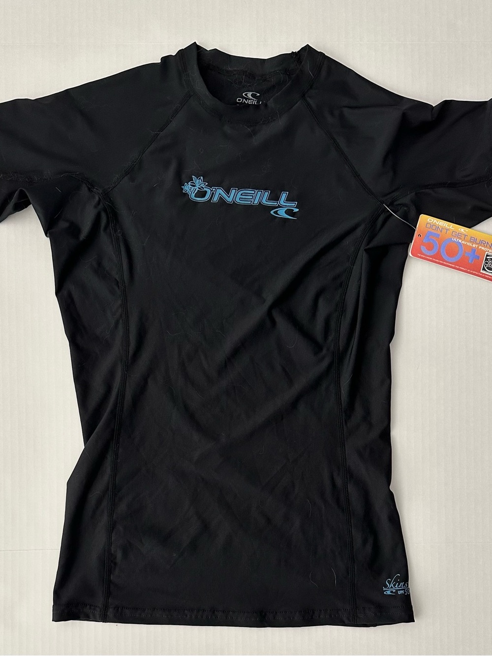 O'Neill Black Short-Sleeve Rash Guard with Light Blue Logo